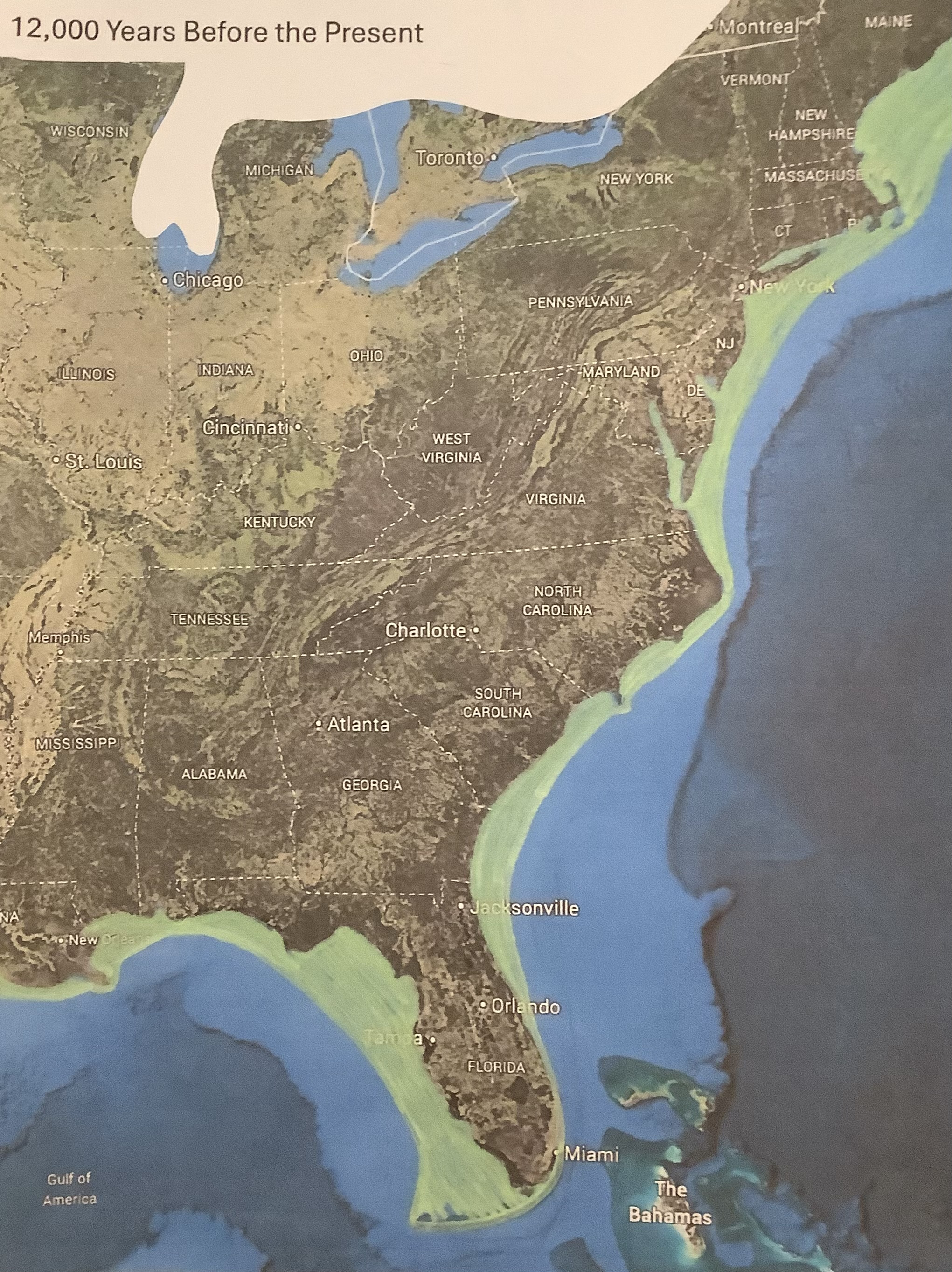 photograph of old world map on desk